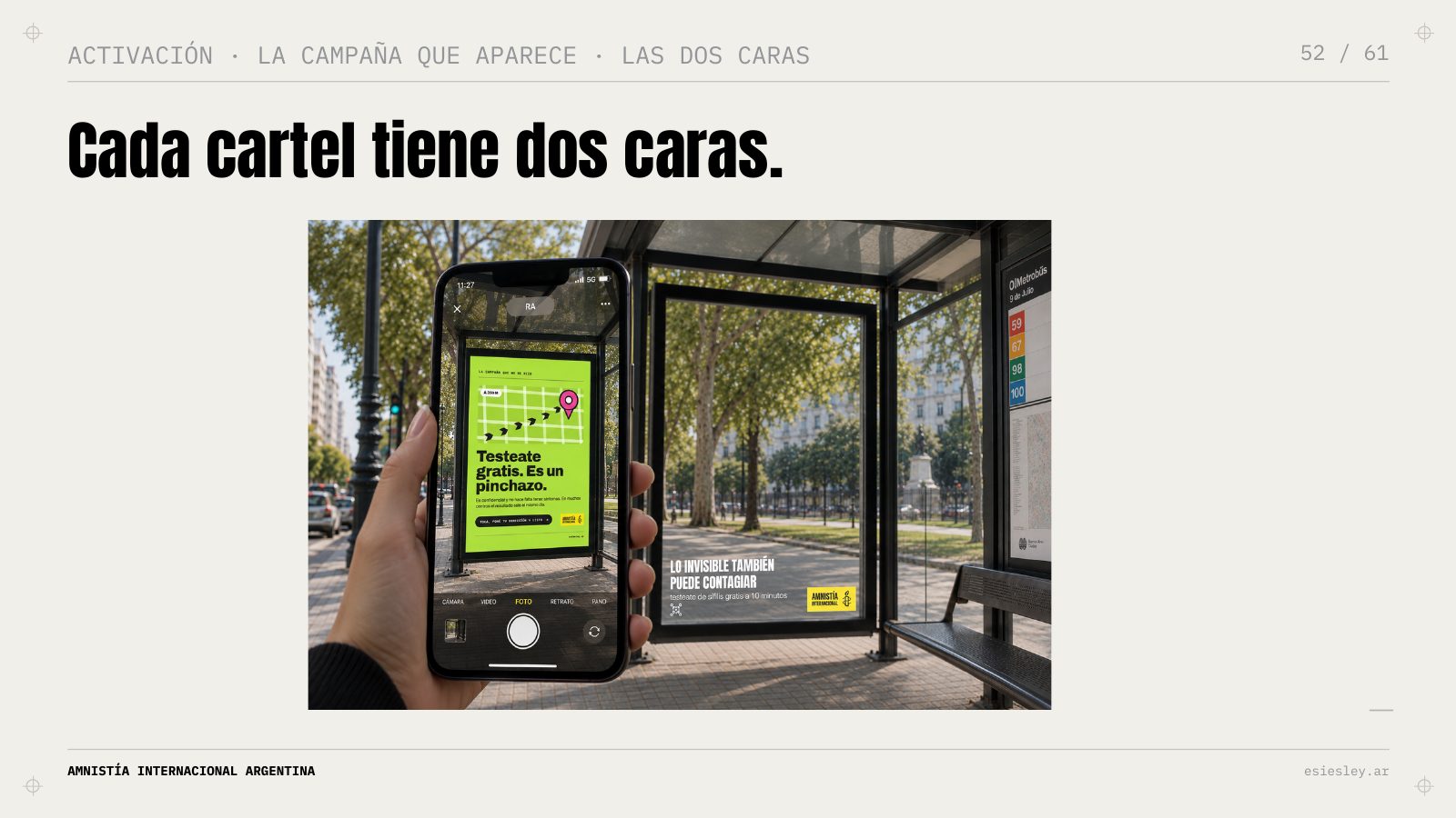 Phone revealing the AR campaign on an empty poster