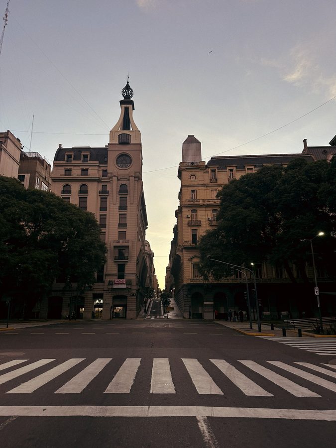 Empty crossing and a clock tower at dusk, Buenos Aires